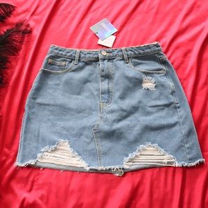 Distressed light wash denim skirt from Misguided